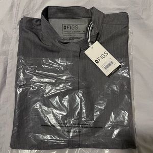 Ranging sizes (L, XL, XXL) in various FIGS SCRUB TOPS. Royal blue, navy, grey.